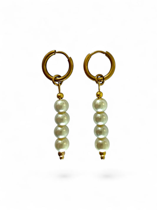 Aloura hoops zijn minimalistische en tijdloze oorbellen voor dagelijks gebruik