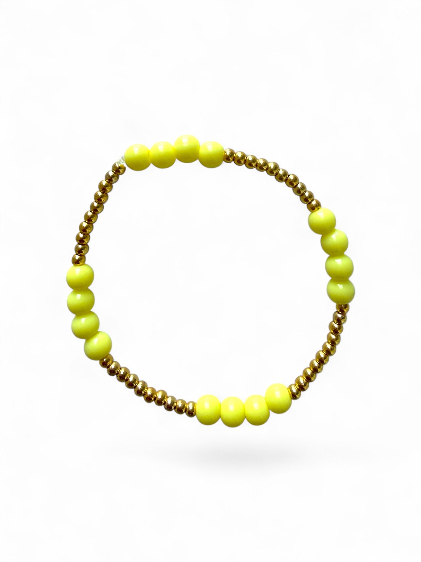 Sunshine armband met gele en gouden kralen